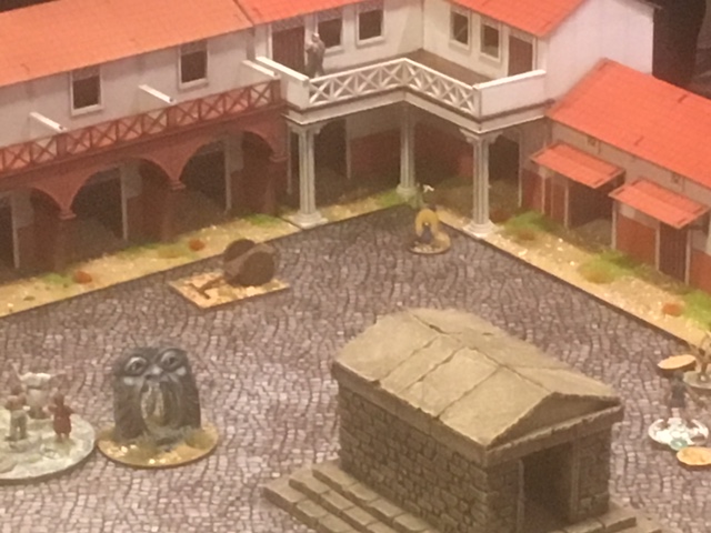 A corner of the marketplace with a single figure